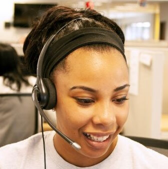 Smiling customer service representative wearing a headset